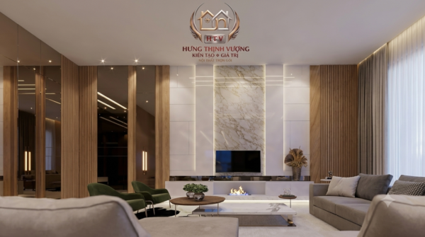 Mẫu vách ốp tivi phòng khách sang trọng bằng tấm Nano vân đá kết hợp lam sóng và nẹp vàng tại Vĩnh Phúc